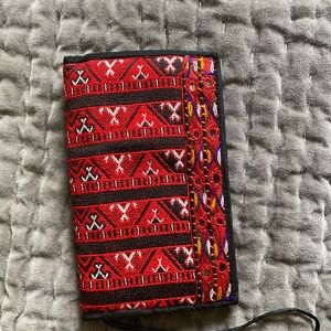 Hand made with embroidery.